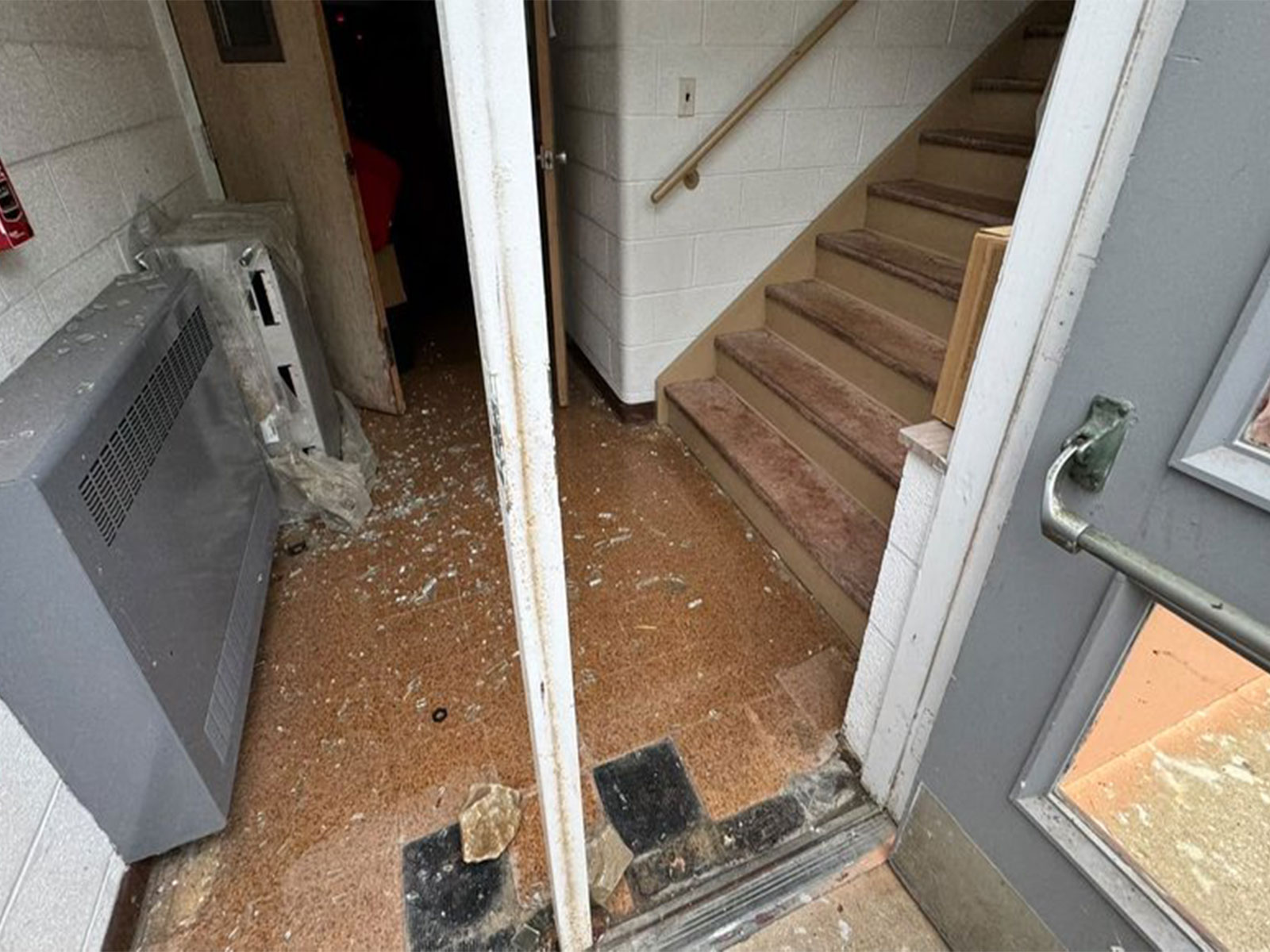 Shattered glass and scattered bricks litter the entryway of the Shree Swaminarayan Vadtal Dham Hindu Mandir in Richmond Heights, Ohio, following an attack on the temple. (Photo: X/@HinduAmerican)