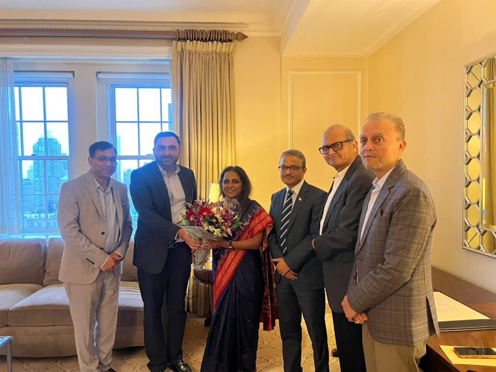 Sripriya Ranganathan, Secretary (CPV & OIA), Ministry of External Affairs, is greeted with a bouquet by Indian diaspora leaders during her interaction in New York. (Image Source: Press Release)