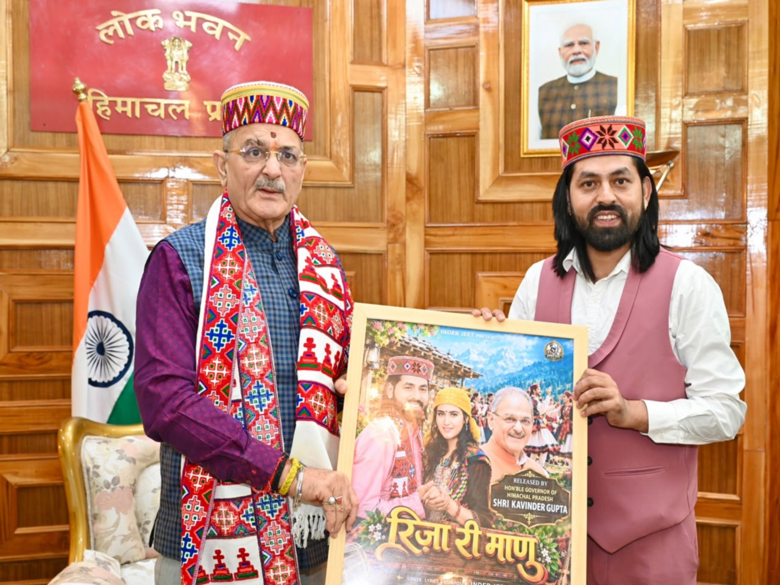 Himachal Pradesh Governor Kavinder Gupta launches Himachali folk singer Inder Jeet’s new song (Photo/ANI)