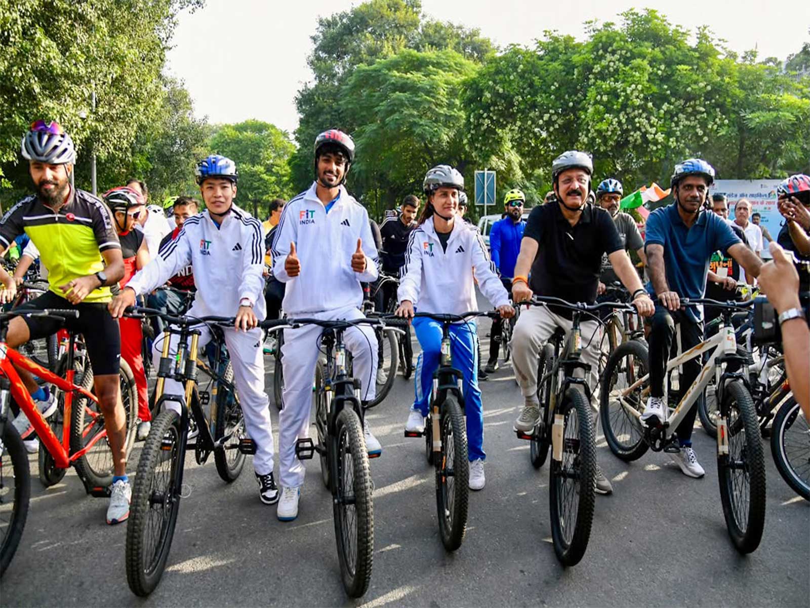 Asian Games 2026 medallists with Delhi Minister Ashish Sood during Fit India Sundays on Cycle event. (Photo: SAI Media)