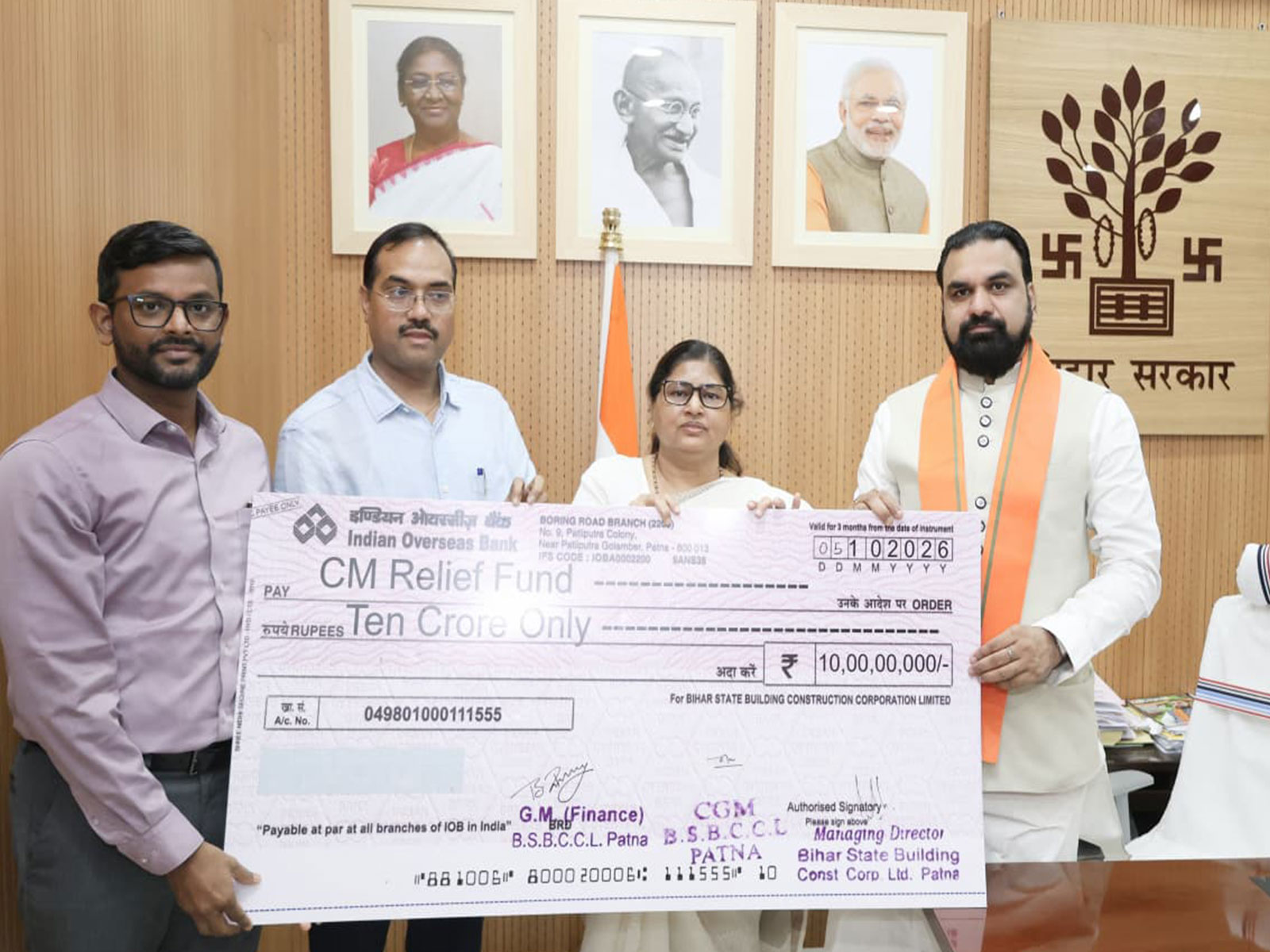 The Bihar State Building Construction Corporation Limited presented a cheque of ₹10 crore to the CM's Relief Fund, to CM Samrat Choudhary (Photo/ANI)