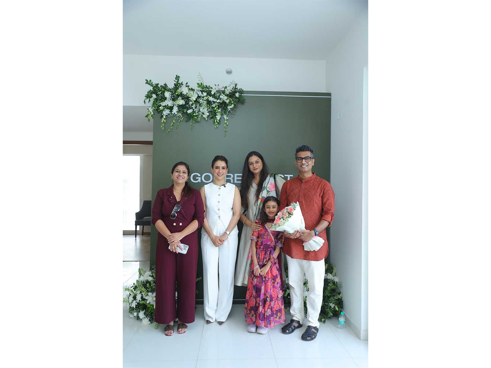Actor Sanya Malhotra surprising the 100th Godrej Properties’ home owner, Mr. Sampath Kumar Bodhulla, Mrs. Charu Bodhulla
