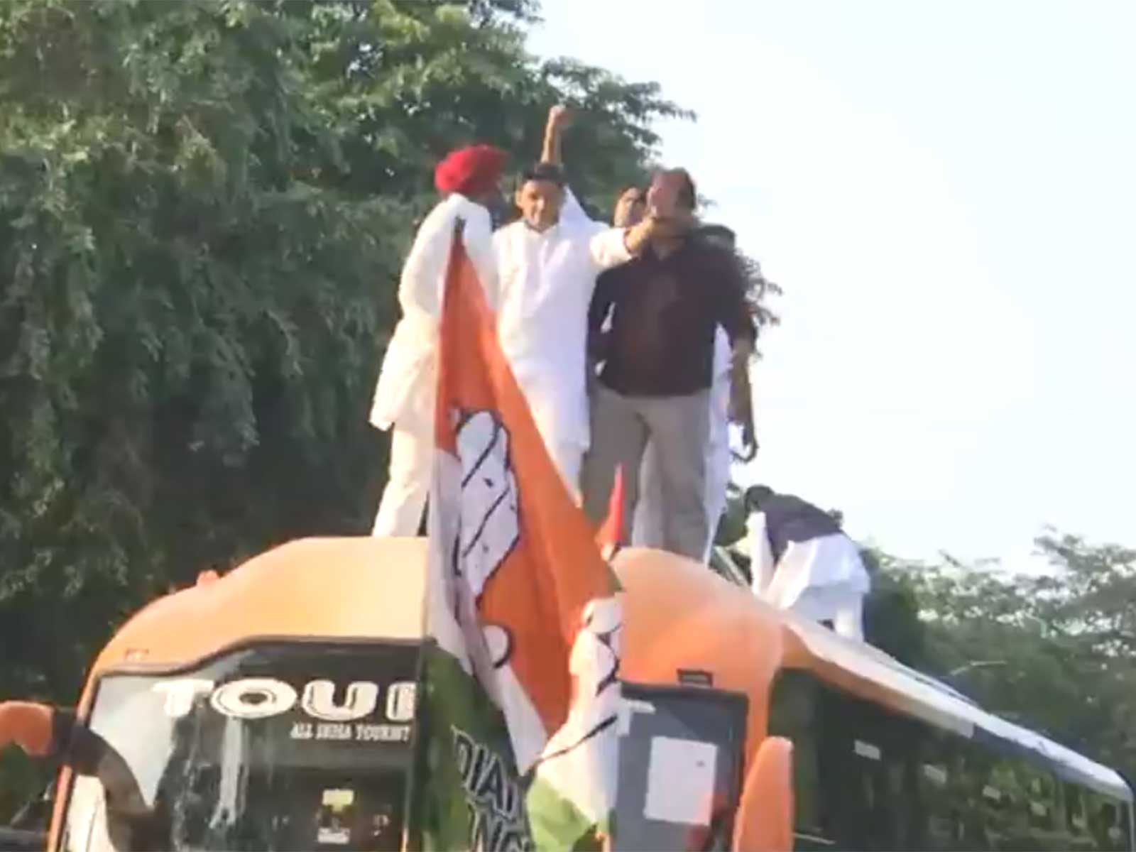 Opposition party leaders climed atop bus ahead of Jantar Mantar protest (Photo/ANI)