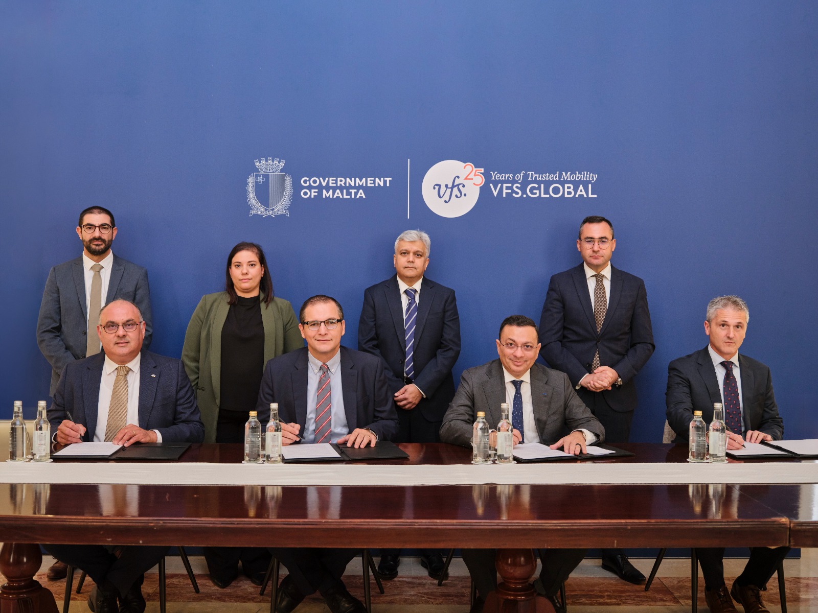 Carlos Tabone-Permanent Secy-Govt of Malta; (seated) Pierre Fenech, CEO,Govt of Malta; Jiten Vyas-Chief Commercial Officer VFS Global(Photo/Courtesy VFS Global)