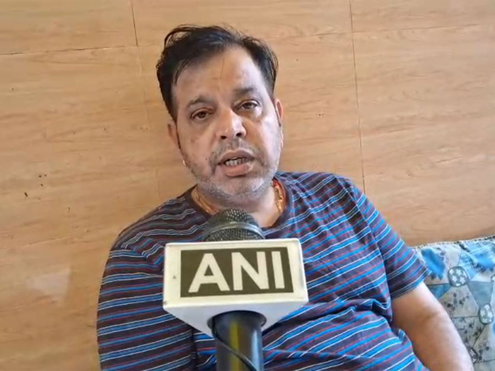Deepak Sharma, victim's brother (photo/ANI)