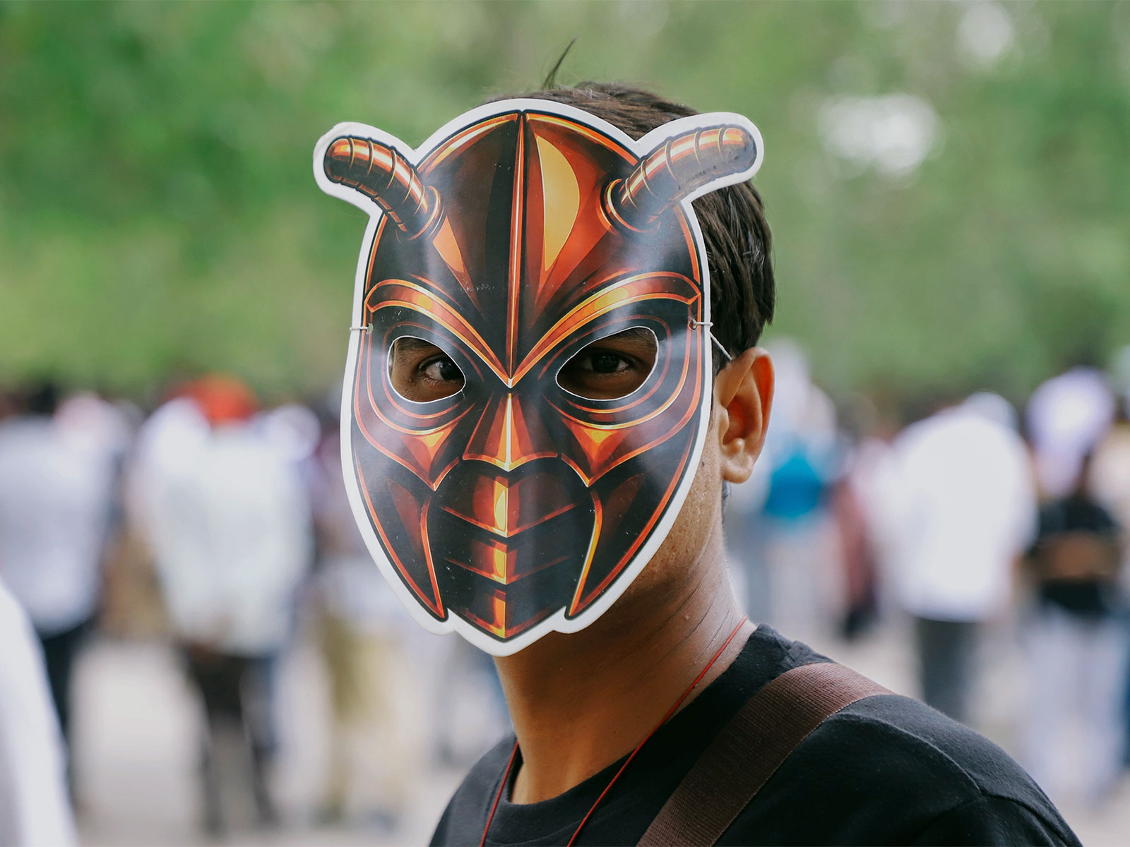 Supporter wears cockroach mask during a protest by Cockroach Janta Party (CJP) in June (File Photo: ANI)