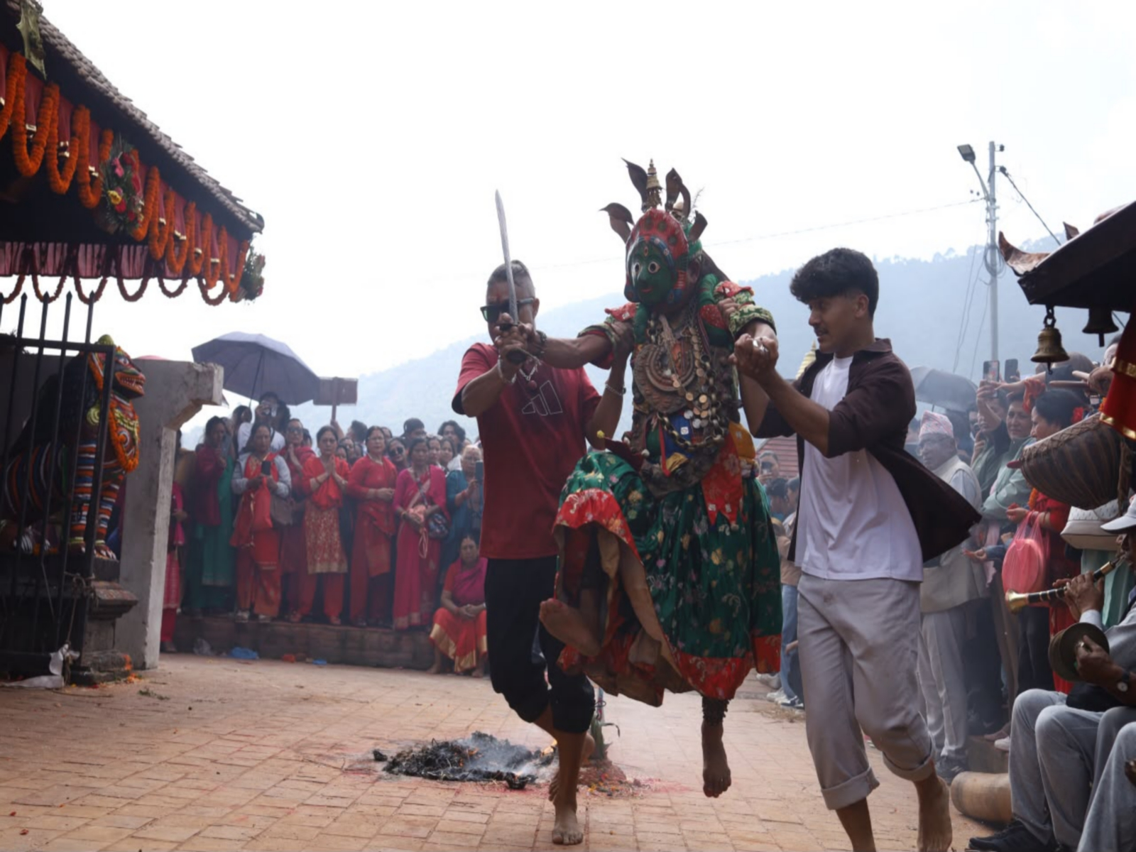 Masked performers take part in the traditional Shikali Jatra festival in Nepal’s Khokana village (Photo/ANI)