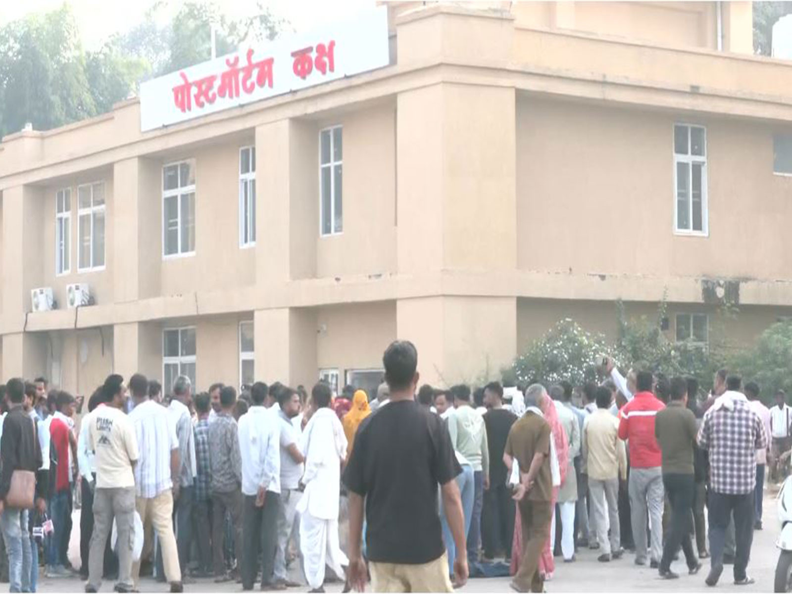MP: Visual from the postmortem centre in Gwalior, where grieving families gathered after the death toll in the truck accident near Sheetla Mata Temple rose to 14, with relatives alleging police negligence (Photo/ANI)