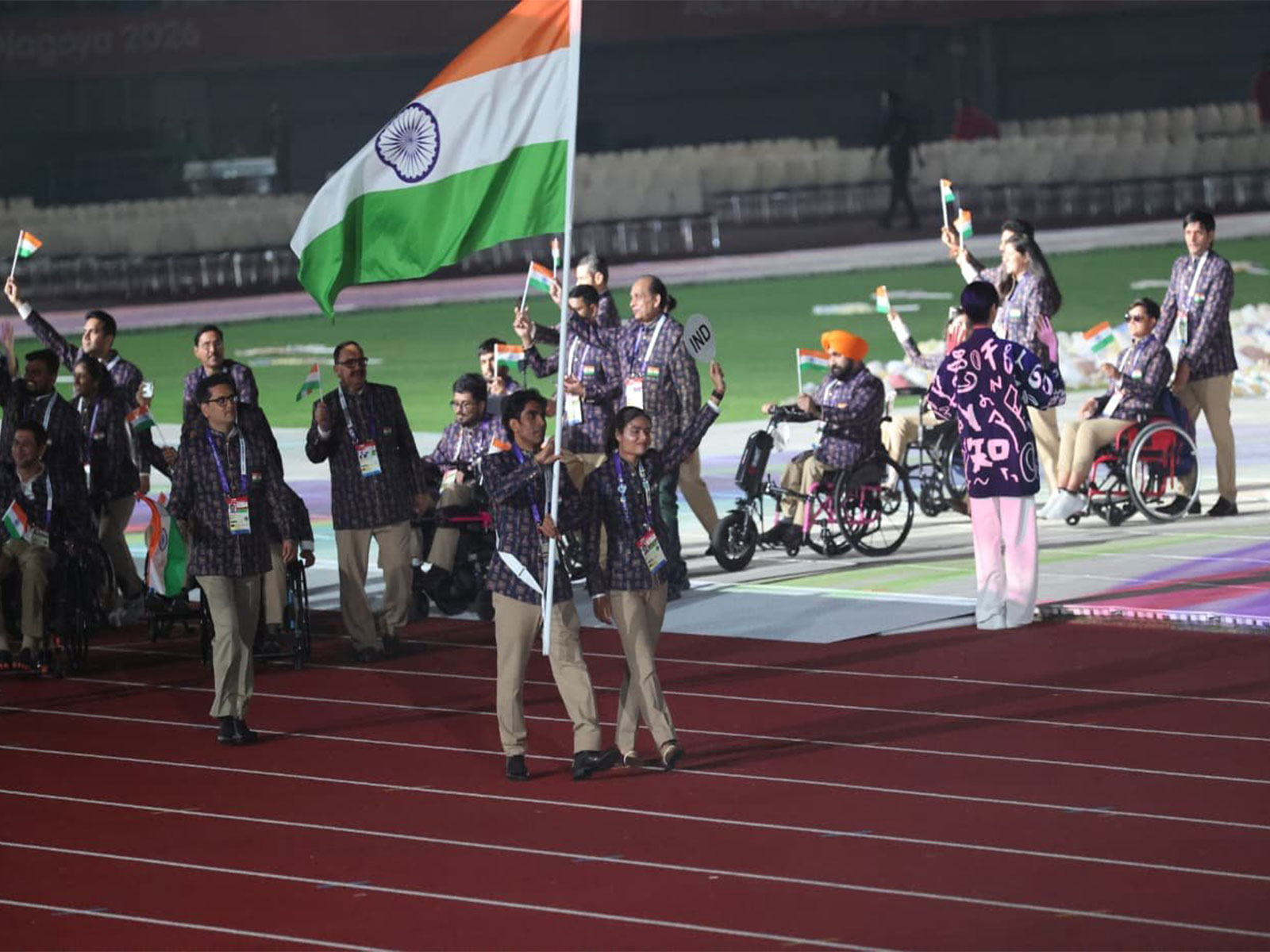Pramod and Simran leading the Indian contingent during opening ceremony. (Photo: @narendramodi X)