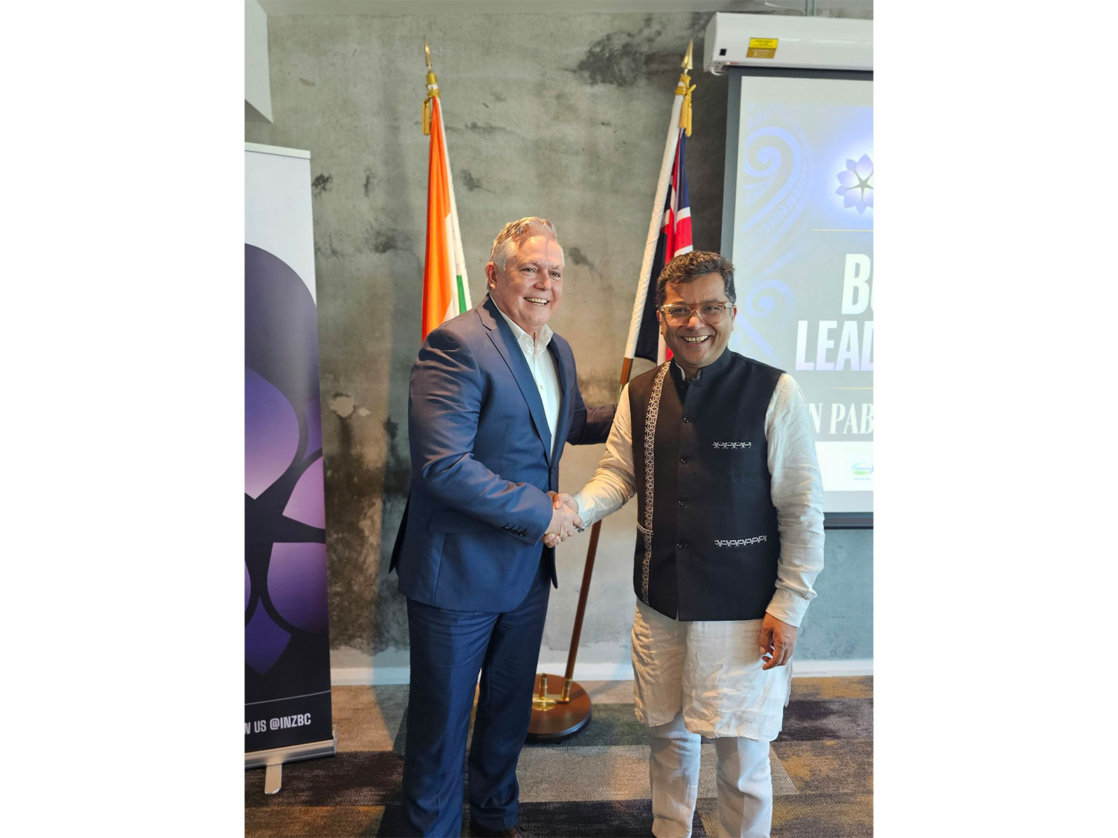 Union Minister of State for External Affairs Pabitra Margherita shakes hands with New Zealand's Minister of Police Mark Mitchell during(Photo: X/@PmargheritaBJP)