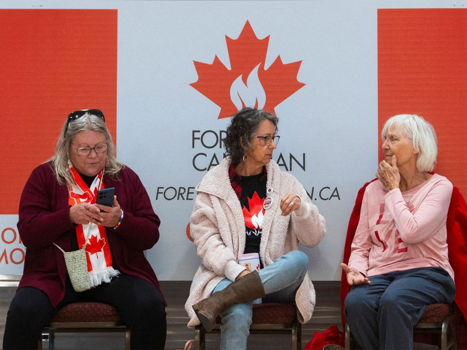 Supporters of the Forever Canadian group, who want Alberta to remain in Canada, sit as they wait for the results (Photo/Reuters)