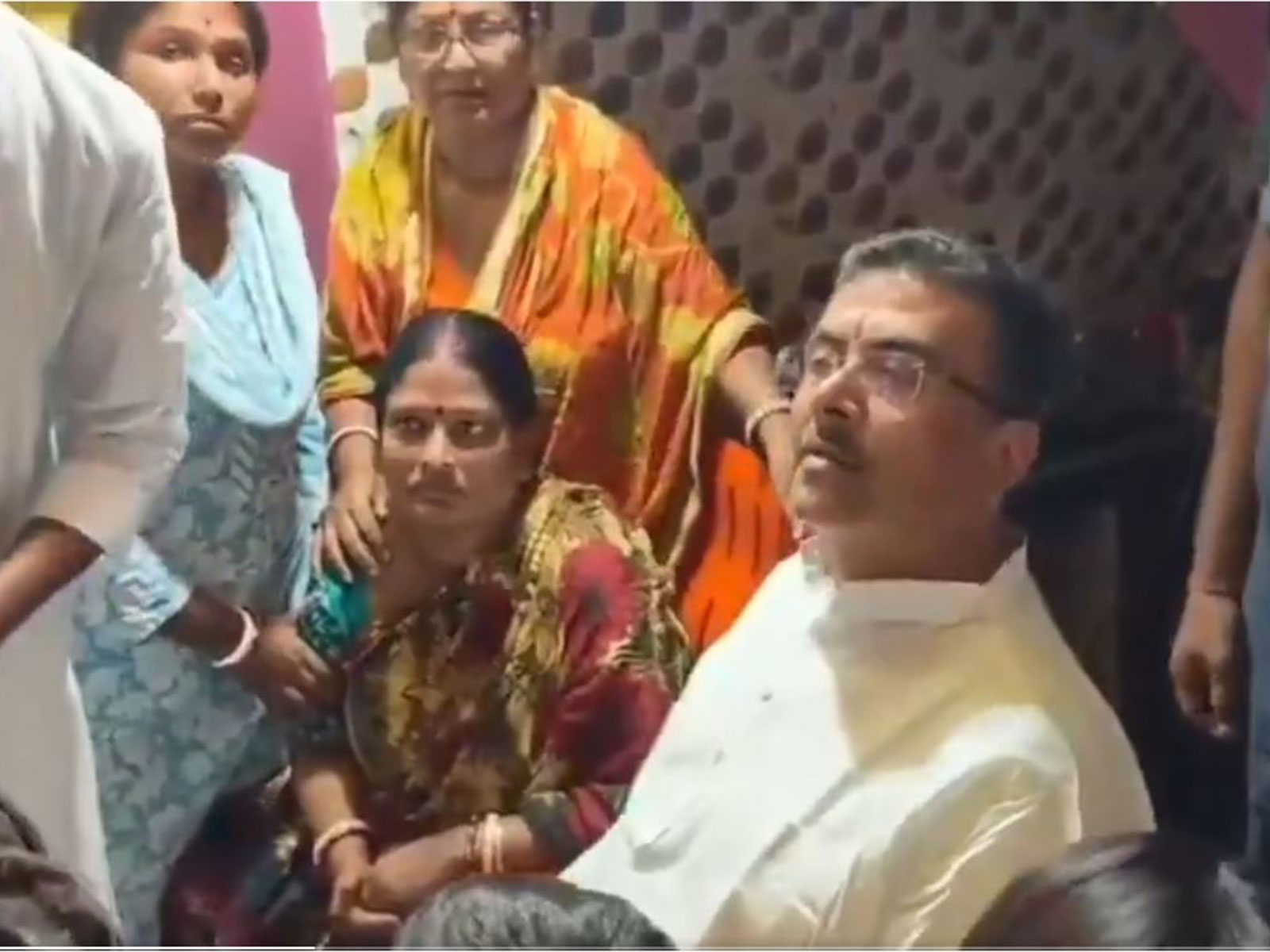 WB CM Adhikari with family of the stampede victim (Photo/ANI)