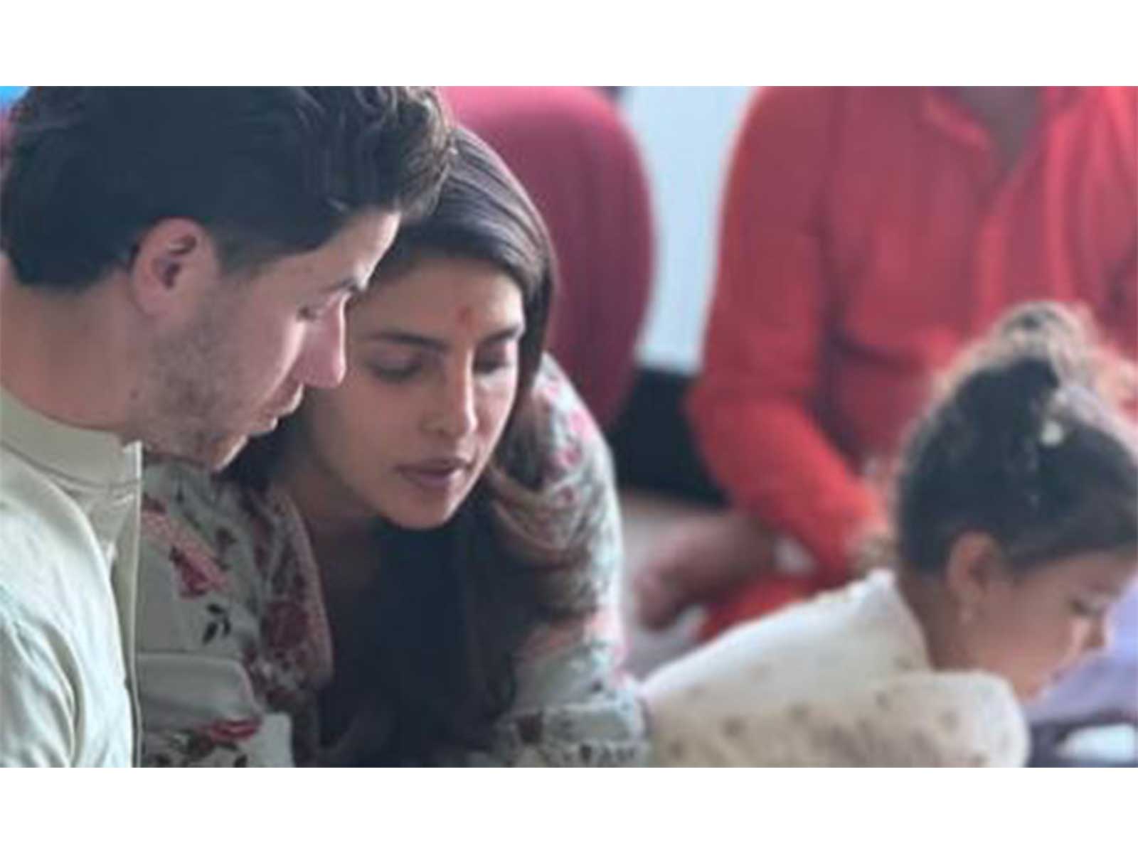 Actor Priyanka Chopra, Nick Jonas and their daughter Maltie (Image source: Priyanka's Instagram)