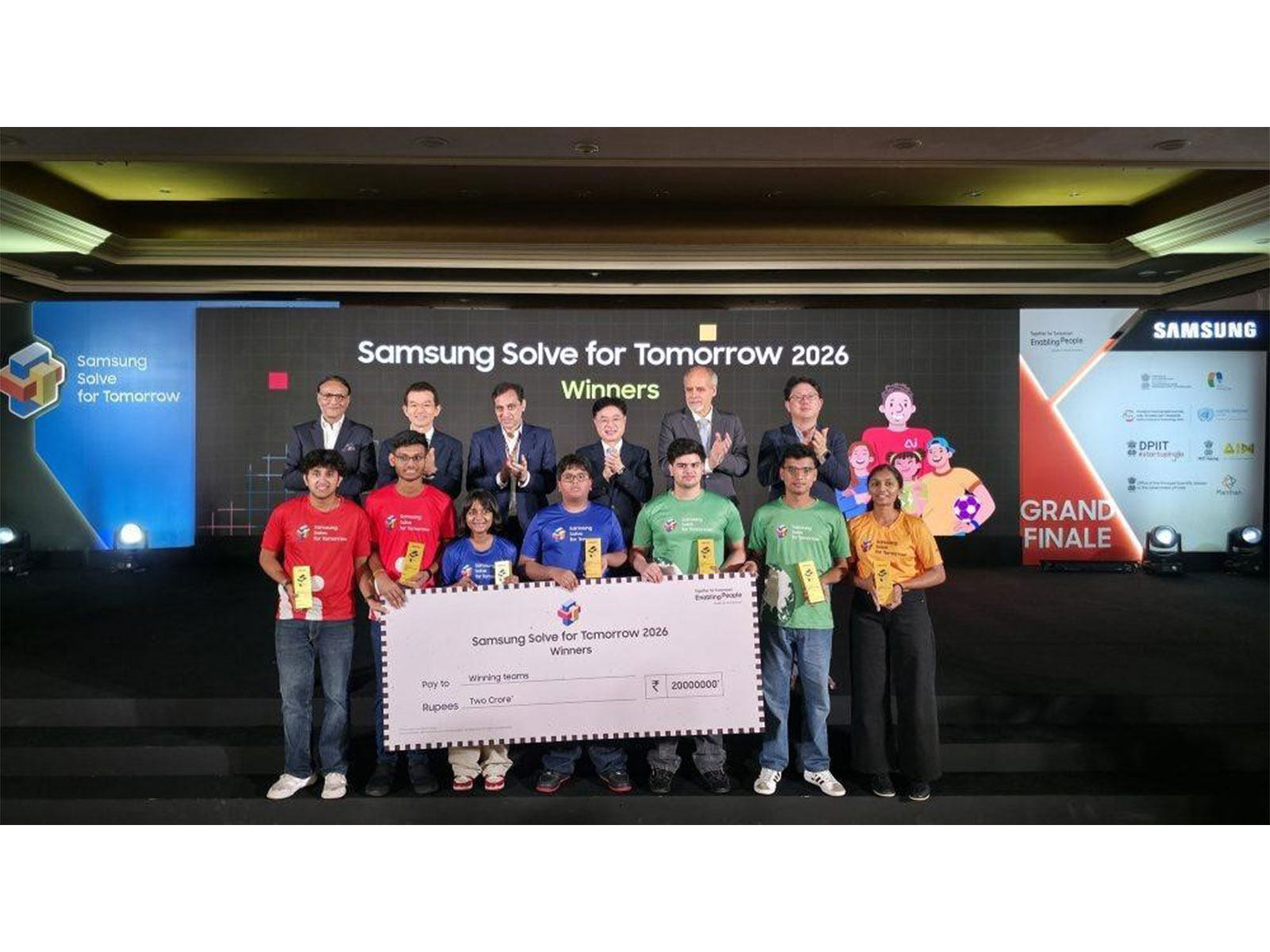 (Left to right) Samsung SWA leaders, MeitY and UN representatives with the winners of Samsung Solve for Tomorrow 2026 (Image Courtesy: Samsung India)
