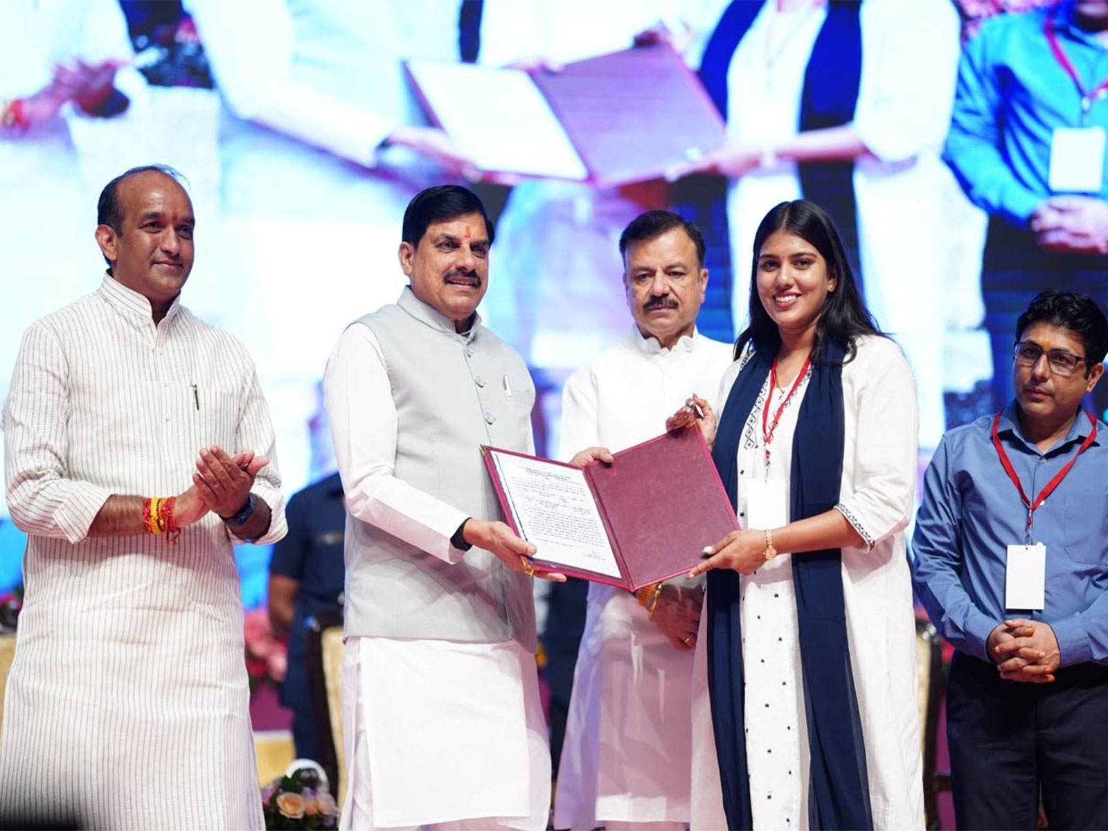 MP CM Mohan Yadav handing over compassionate appointment letter to candidate (Photo/ X @CMMadhyaPradesh)