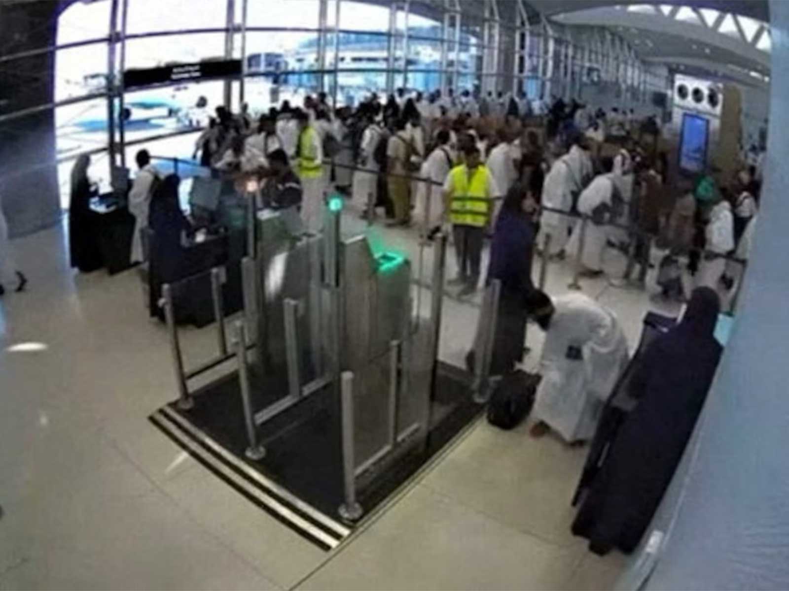 Surveillance footage shows people standing, right before the moment of an attack at King Khalid International Airport in Riyadh, Saudi Arabia. (Photo/Reuters)