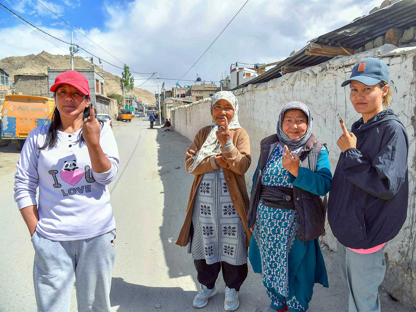 Voters show the mark of indelible ink after casting their vote (File Photo: ANI)