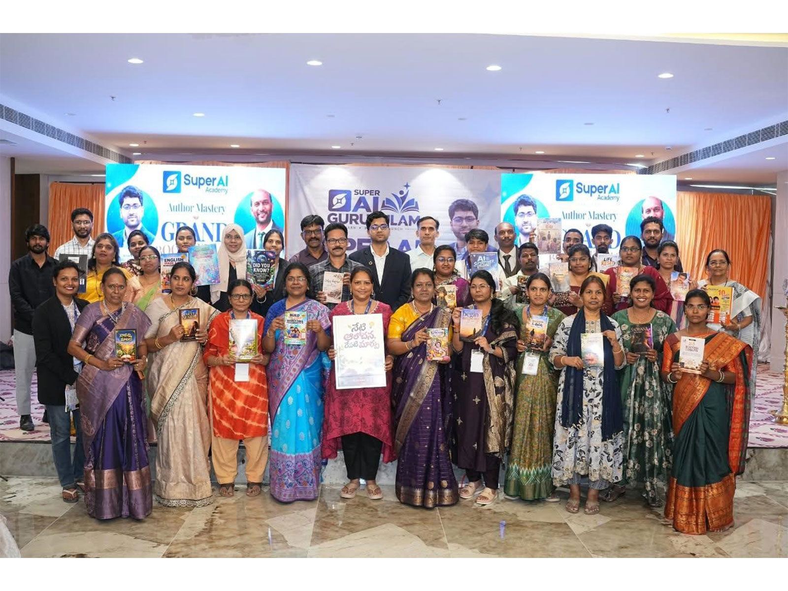 Led by Author Coach Labhishetty Mahesh and AI educator Nikeelu Gunda, aspiring authors celebrate a milestone at SUPER AI Gurukulam 2026.