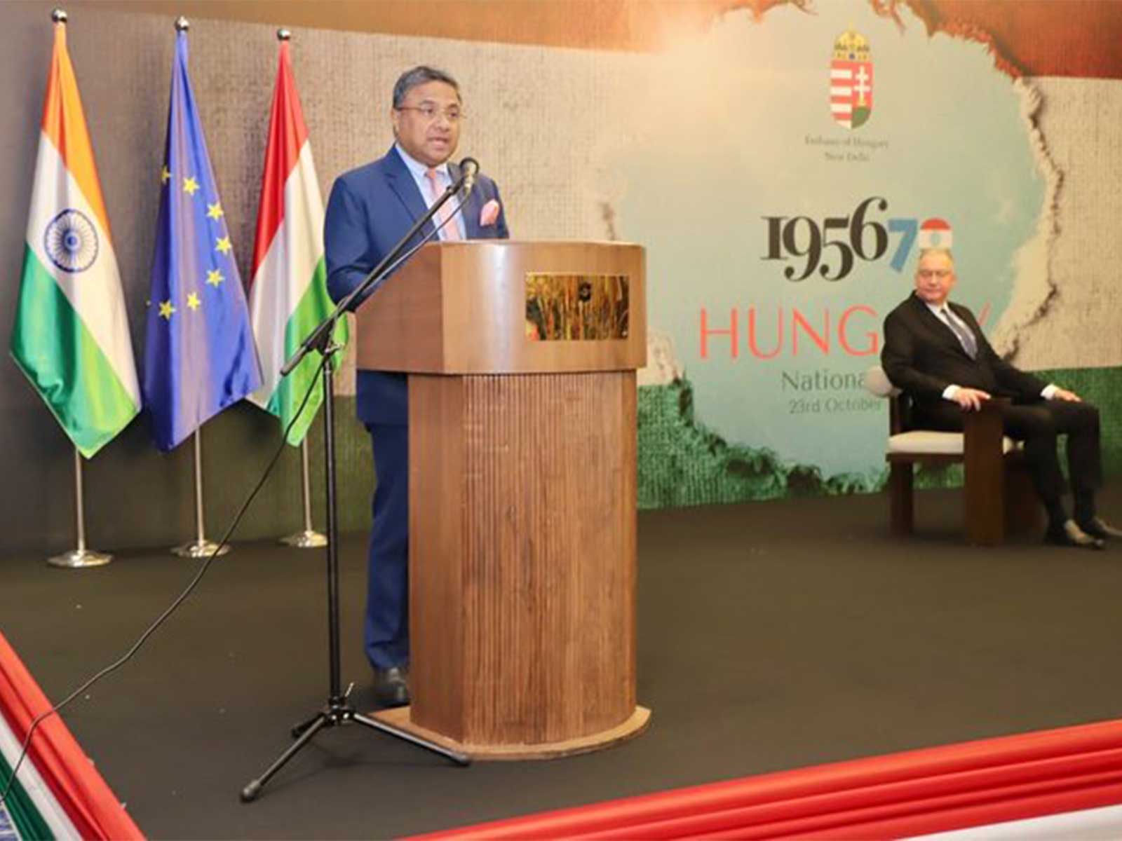 Sibi George, Secretary (West) in the Ministry of External Affairs, addresses Hungary’s National Day celebrations. (Photo: X/@MEAIndia)