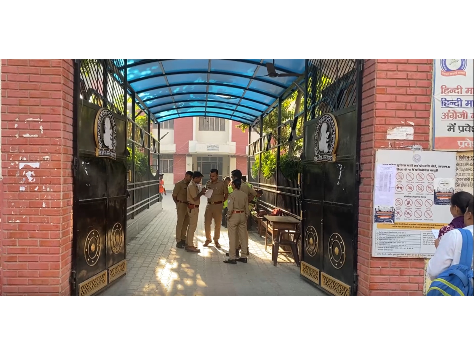 Police officials inspect entry protocols and maintain strict vigil outside an exam venue in Prayagraj. (Photo/ANI)