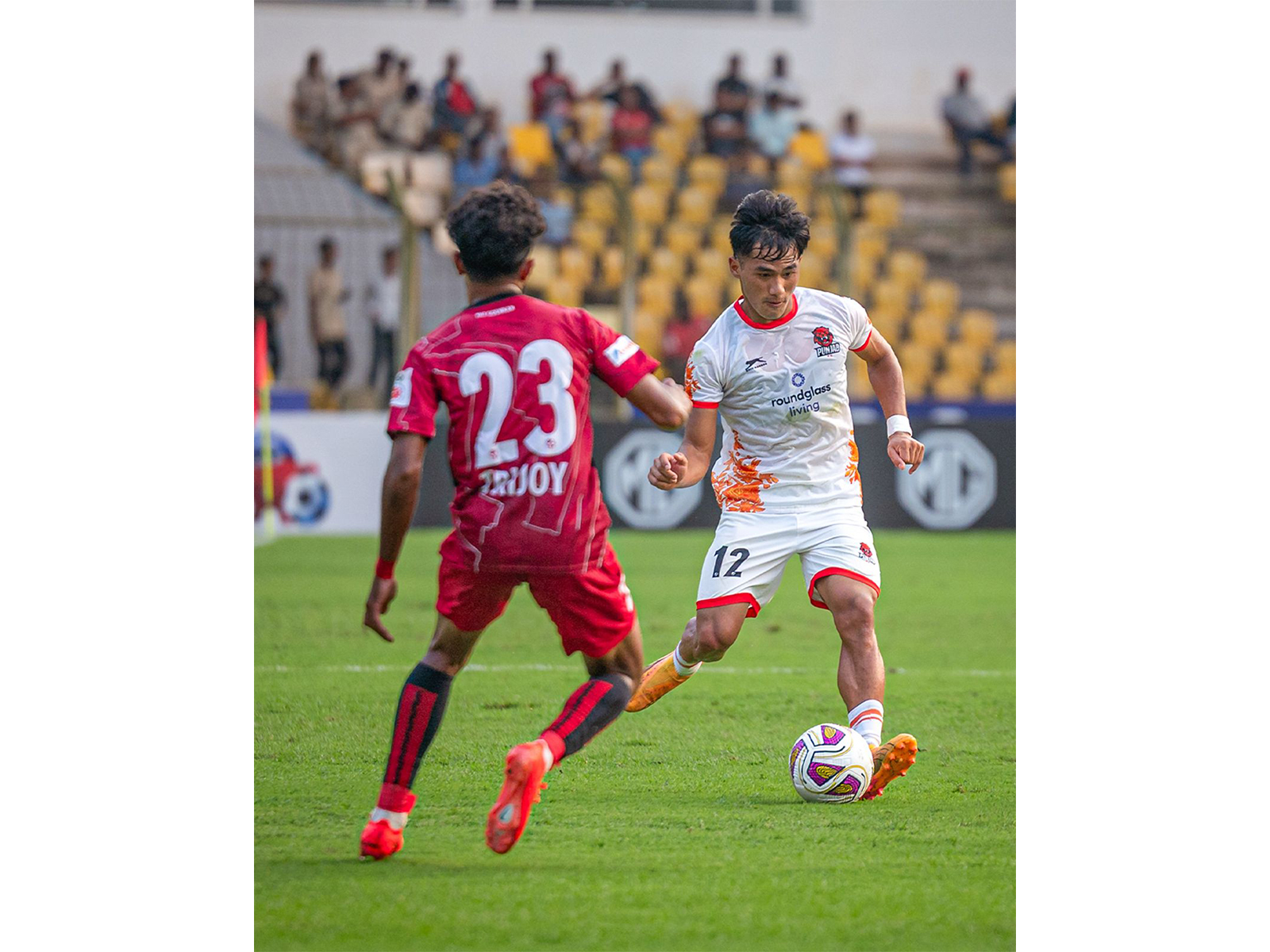 Punjab FC player trying to take the ball against Churchill Brothers in an ISL 2026-27 match. (Photo: Punjab FC)