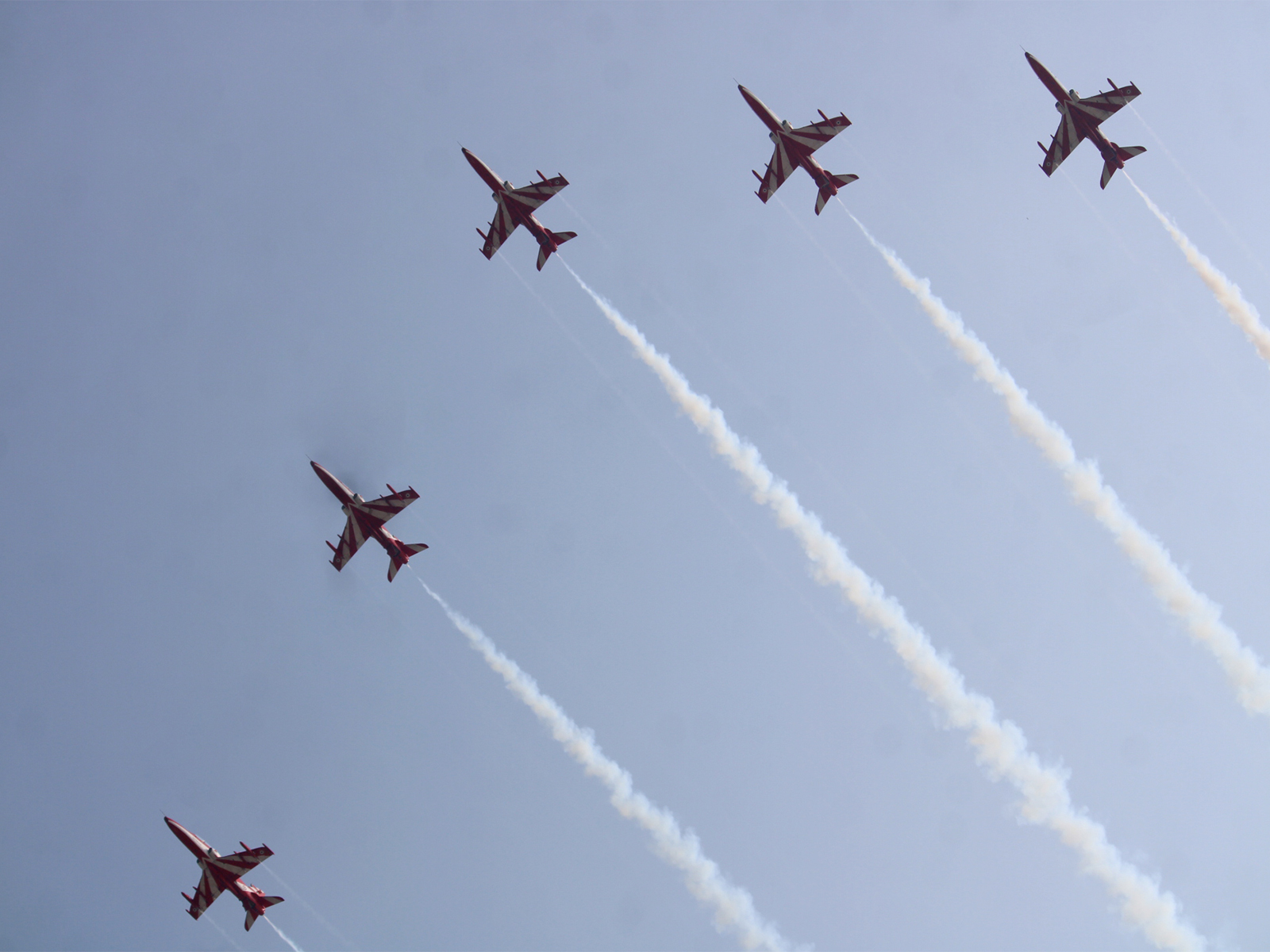 IAF Surya Kiran team performs synchronized aerobatics at ‘Wings Over Ganges’ air show (Photo/ANI)