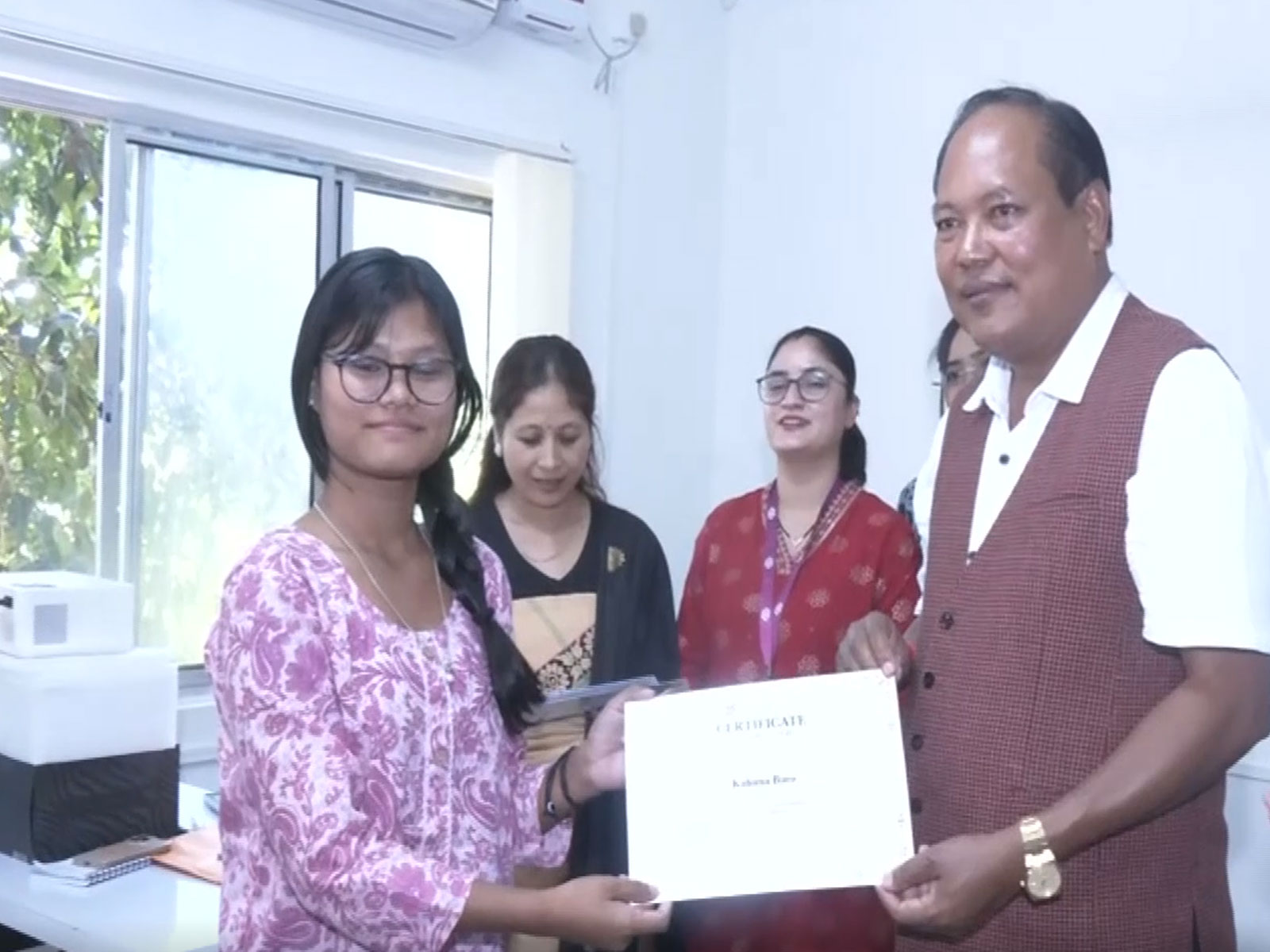 Assam Minister Biswajit Daimary distributes certificates to students at SLCPL training centre (Photo: ANI)