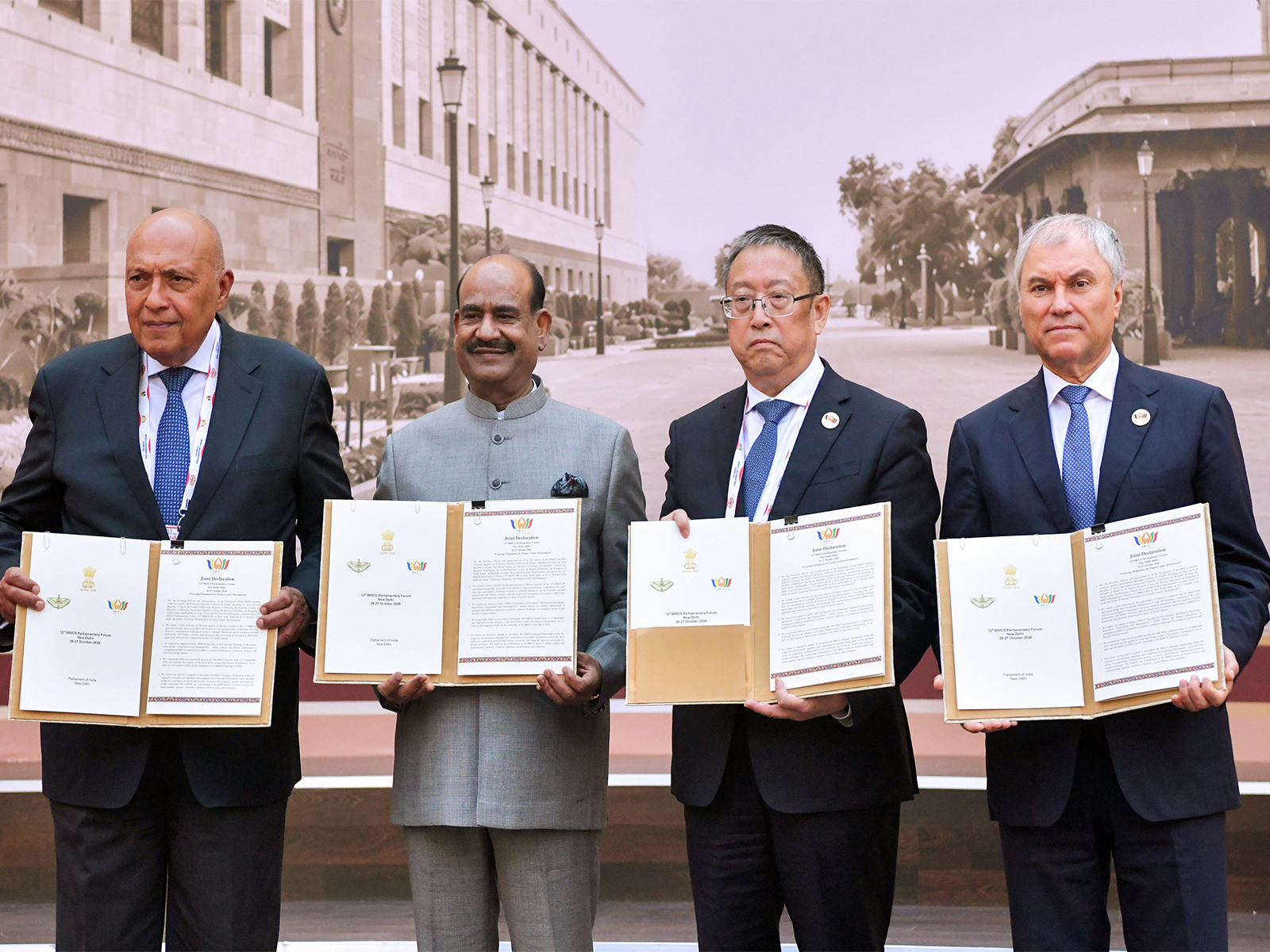  Lok Sabha Speaker Om Birla exchanges the Joint Declaration with China's National People's Congress Vice-Chairperson Zheng Jianbang during the conclusion of the 12th BRICS Parliamentary Forum 2026 (Photo/ANI)