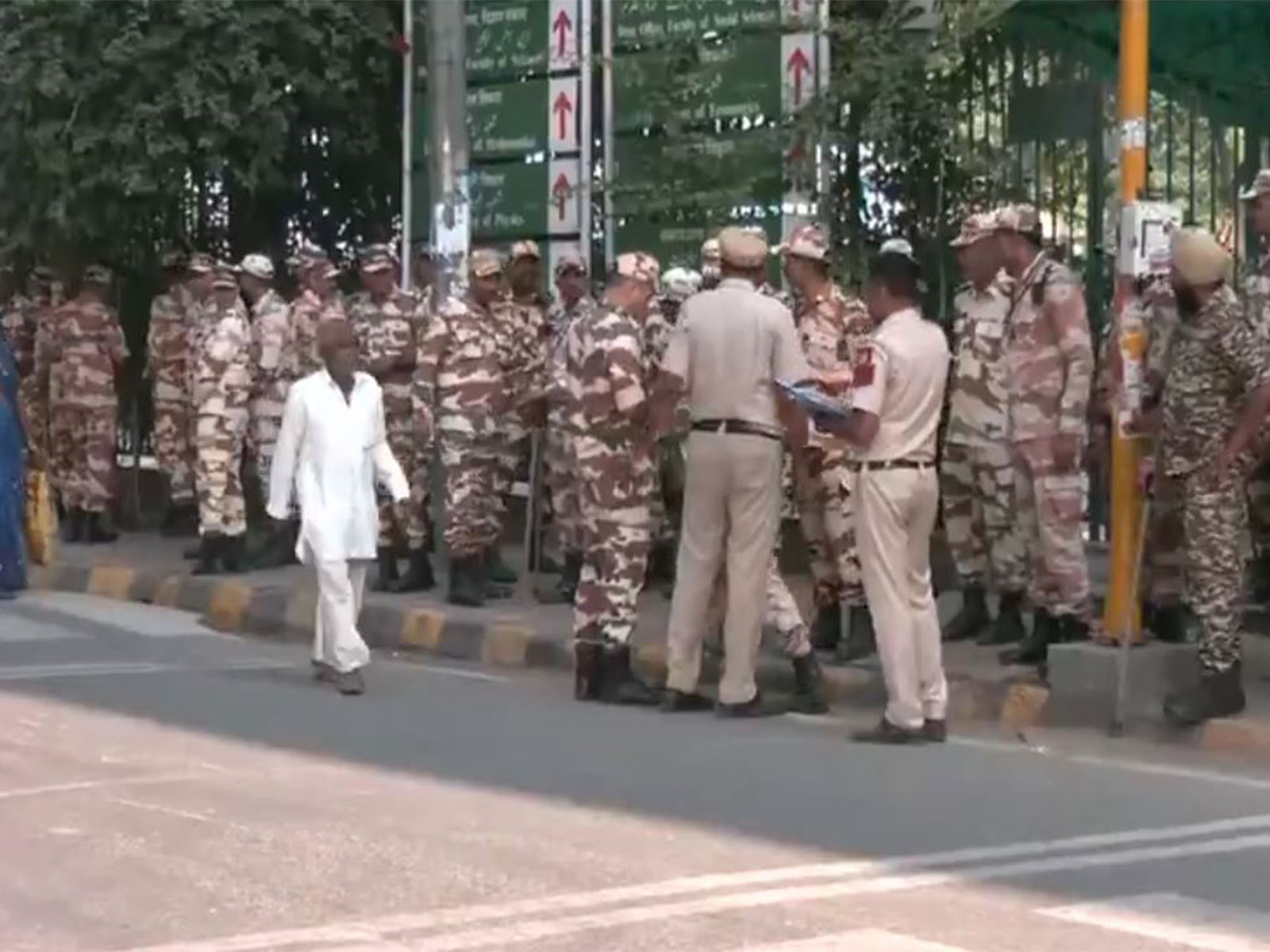 Heavy security personnel, including Delhi Police and paramilitary forces, deployed outside the Jamia Millia Islamia campus (Photo/ANI)