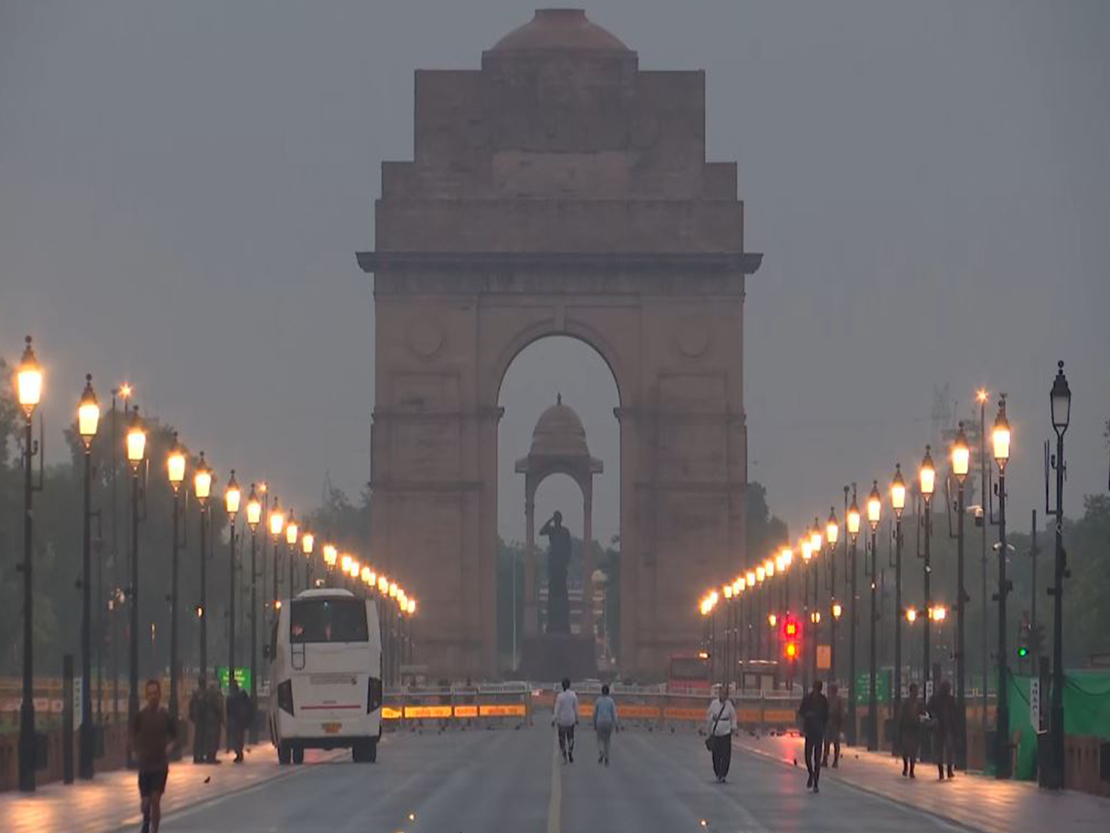 Visuals show India Gate amid wet roads following overnight showers in New Delhi (Photo/ANI)