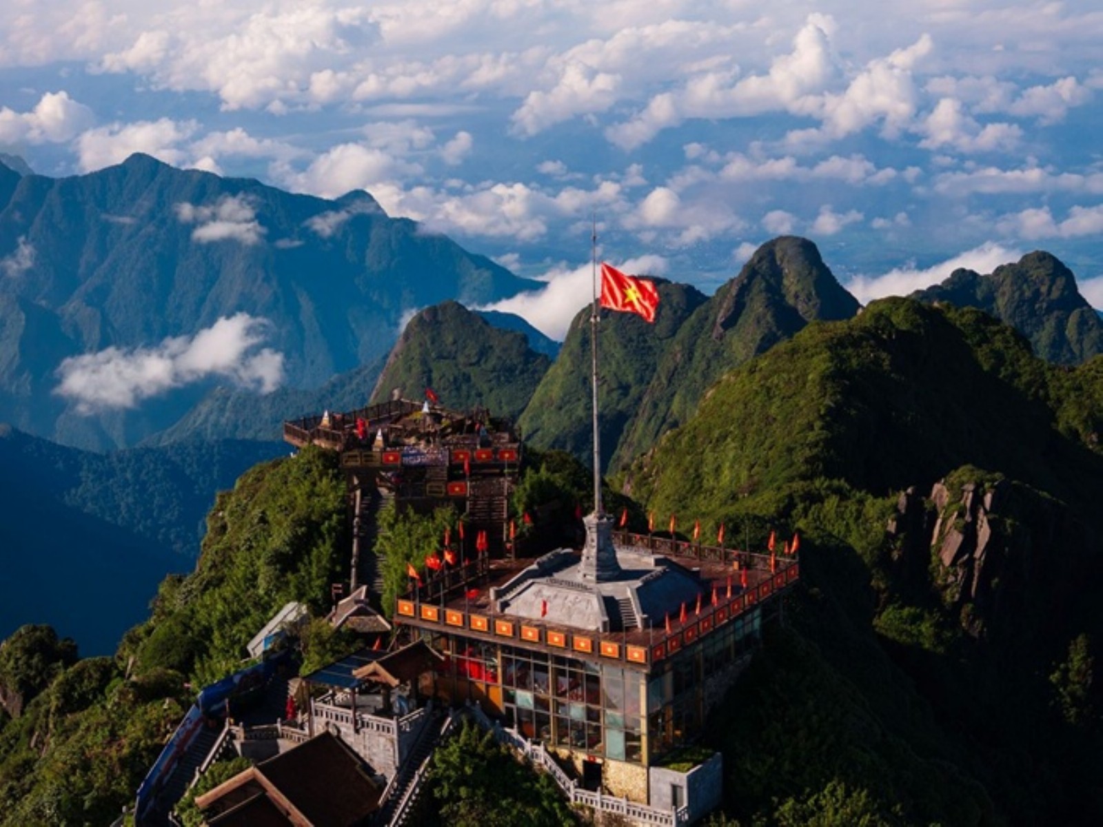 Fansipan summit amid an autumn sea of clouds, a scenic setting for new beginnings during Diwali.