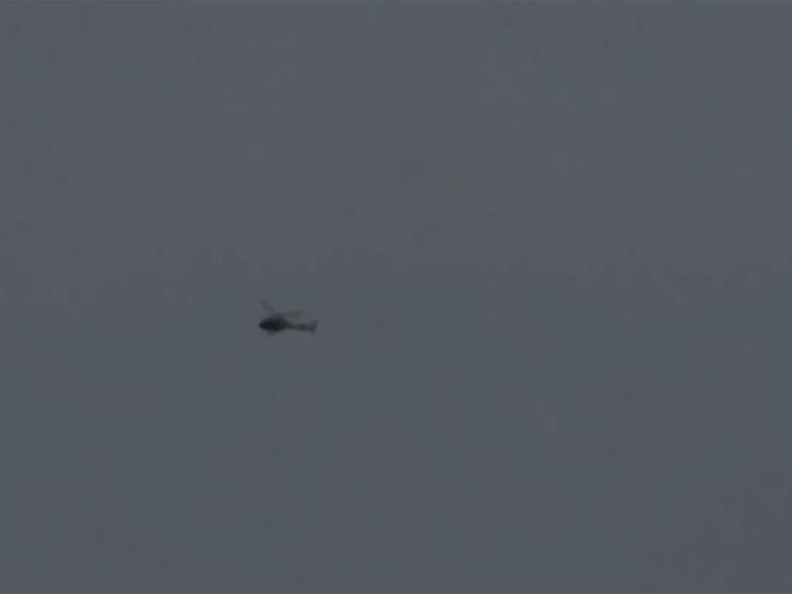 Visuals showing aerial search operation underway to trace the missing helicopter near Joshimath in Chamoli district (Photo/ANI)