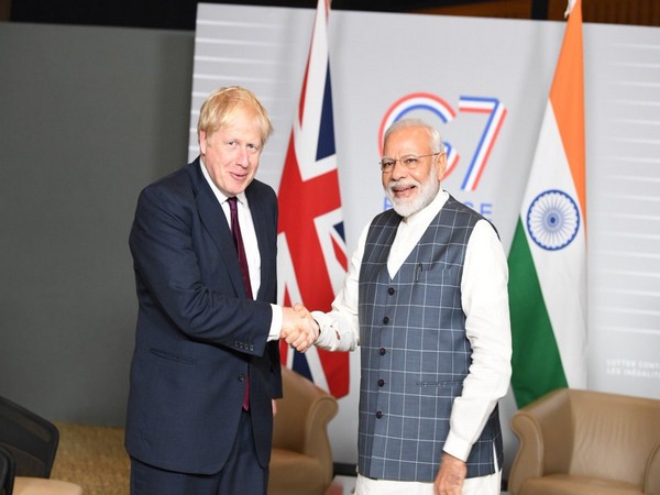 Prime Minister Narendra Modi (L) and his UK counterpart Boris Johnson (file photo)