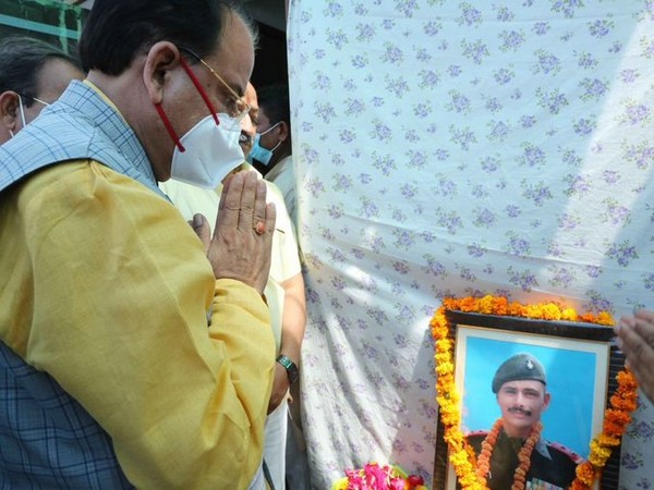 Ajay Bhatt meets family of Subedar Ram Singh who got killed in action in J-K. (Photo/PIB)