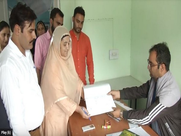 Sharifa Begum, a 64-year-old woman, filing her nomination for Block Development Council polls in Doda district. Photo/ANI Sharifa Begum, a 64-year-old woman, filing her nomination for Block Development Council polls in Doda district. Photo/ANI