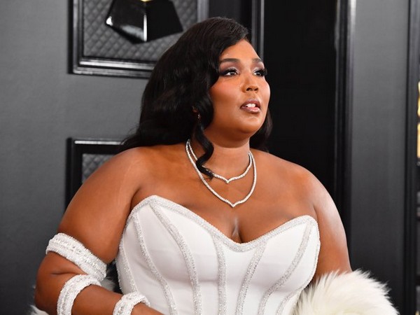 American singer-songwriter Lizzo at the red carpet of 62nd Grammy Awards (Image Source: Grammy Twitter) American singer-songwriter Lizzo at the red carpet of 62nd Grammy Awards (Image Source: Grammy Twitter)