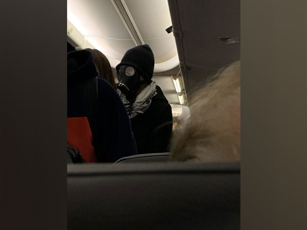 The man, whose identity is still unknown was subsequently escorted off the plane (Picture Courtesy: Twitter) The man, whose identity is still unknown was subsequently escorted off the plane (Picture Courtesy: Twitter)