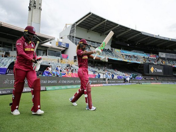 West Indies openers going out to bat against Thailand (Photo/ T20 World Cup Twitter) West Indies openers going out to bat against Thailand (Photo/ T20 World Cup Twitter)