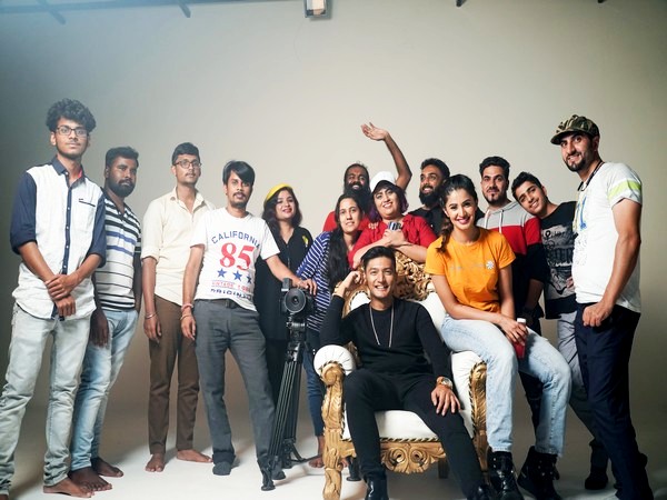 Ishviene, in white cap, with her team members of Ishkaa Studios