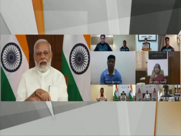 PM Modi interacting with athletes. 