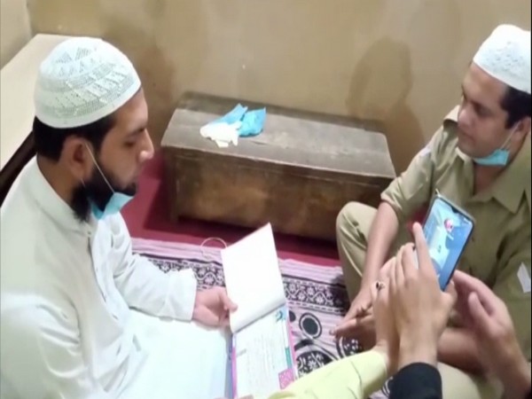 Police Constable Mohsin Saifi reading his wedding vows. Photo/ANI Police Constable Mohsin Saifi reading his wedding vows. Photo/ANI