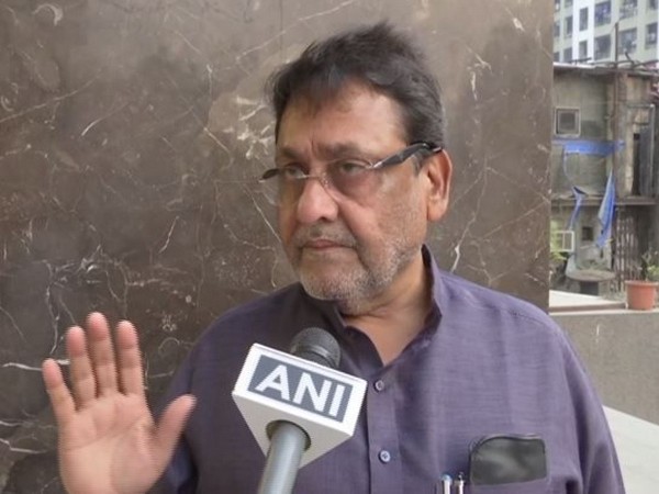 NCP leader Nawab Malik speaking to ANI on Sunday. Photo/ANI
