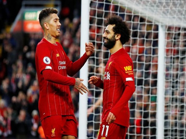 Liverpool's Roberto Firmino with Mohamed Salah Liverpool's Roberto Firmino with Mohamed Salah