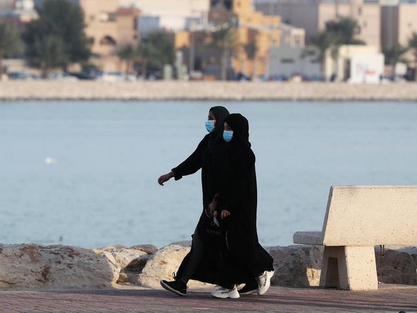 Women wear protective face masks, as they walk, after Saudi Arabia imposed a temporary lock-down on the province of Qatif, following the spread of coronavirus. Women wear protective face masks, as they walk, after Saudi Arabia imposed a temporary lock-down on the province of Qatif, following the spread of coronavirus.