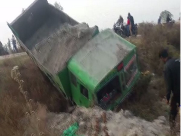Dumper truck at accident site in Jalgaon in Maharashtra Photo/ANI Dumper truck at accident site in Jalgaon in Maharashtra Photo/ANI