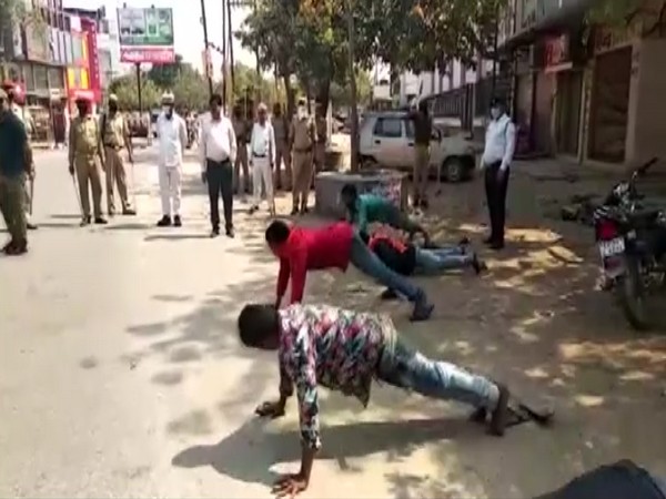 Uttar Pradesh Police on Wednesday asked lockdown violators in Mau to do push-ups and squat as a punishment. Uttar Pradesh Police on Wednesday asked lockdown violators in Mau to do push-ups and squat as a punishment.