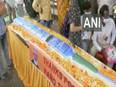 PM Modi's birthday: BJP workers cut 71-feet-long syringe-shaped cake in MP - Vimarsana News