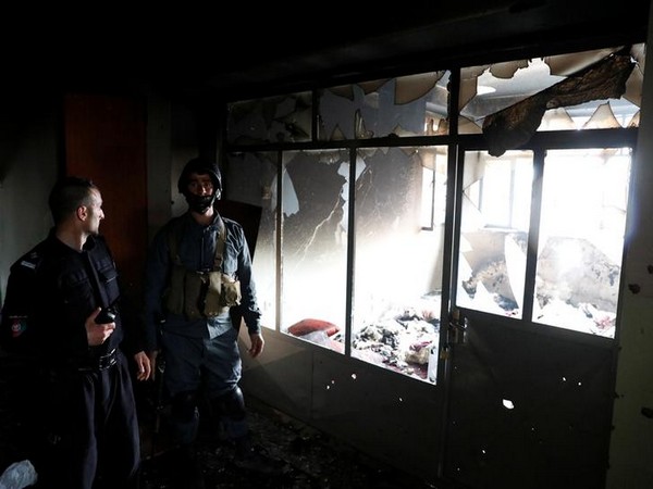 Afghan policemen inspect inside a Sikh religious complex after an attack in Kabul Afghan policemen inspect inside a Sikh religious complex after an attack in Kabul