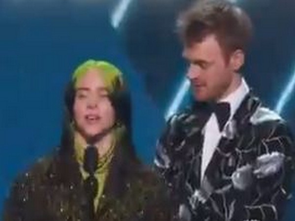 Singer Billie Eilish and brother Finneas accepting Grammy award (Image Source: Grammy Twitter) Singer Billie Eilish and brother Finneas accepting Grammy award (Image Source: Grammy Twitter)