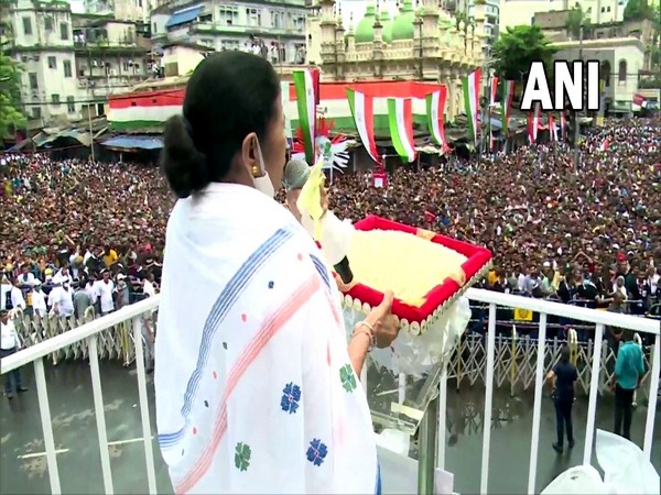 TMC supremo and West Bengal CM Mamata Banerjee Addressing the public gathered at TMC's Martyr's Day Rally in Kolkata's Esplanade. (ANI/photo) TMC supremo and West Bengal CM Mamata Banerjee Addressing the public gathered at TMC's Martyr's Day Rally in Kolkata's Esplanade. (ANI/photo)